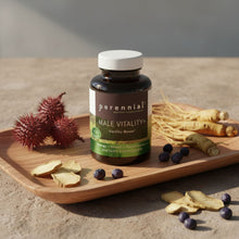 Load image into Gallery viewer, Perennial Male Vitality+ supplement bottle on a wooden tray with natural ingredients
